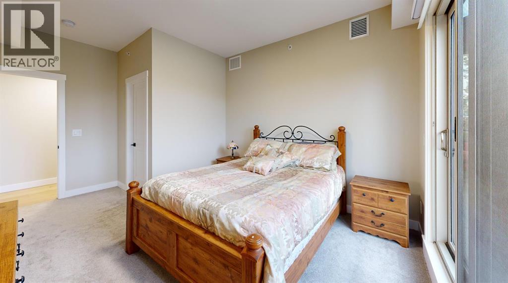 409, 15 Cougar Ridge Landing Sw, Calgary, Alberta  T3H 6C3 - Photo 12 - A2223664