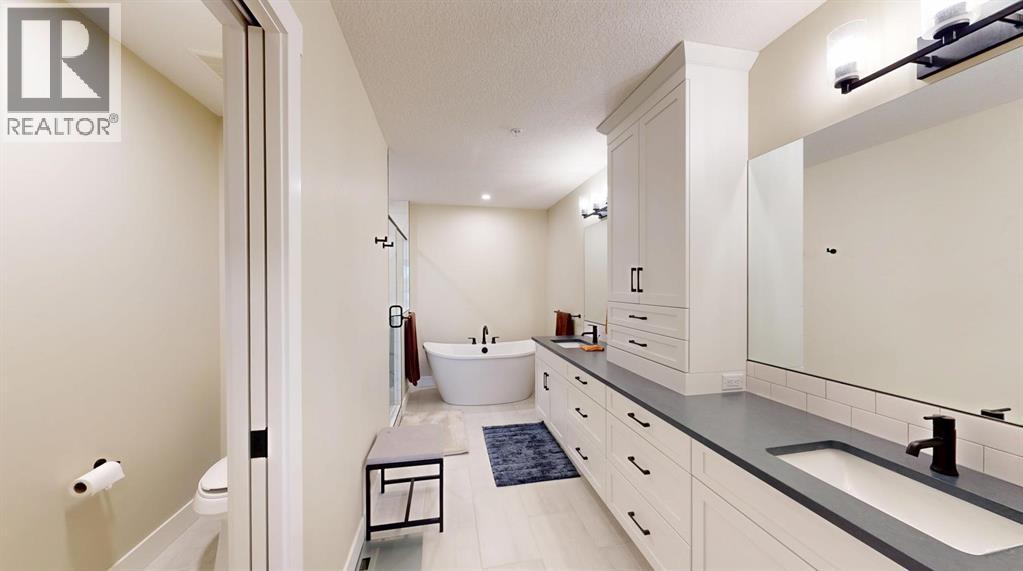 409, 15 Cougar Ridge Landing Sw, Calgary, Alberta  T3H 6C3 - Photo 9 - A2223664