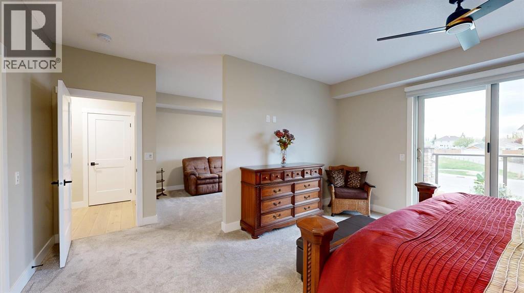 409, 15 Cougar Ridge Landing Sw, Calgary, Alberta  T3H 6C3 - Photo 7 - A2223664