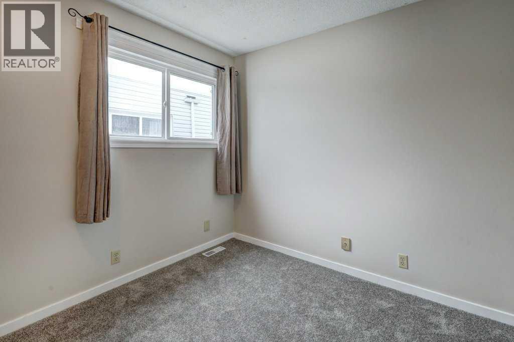 1, 519 64 Street Ne, Calgary, Alberta  T2K 2M7 - Photo 19 - A2215361