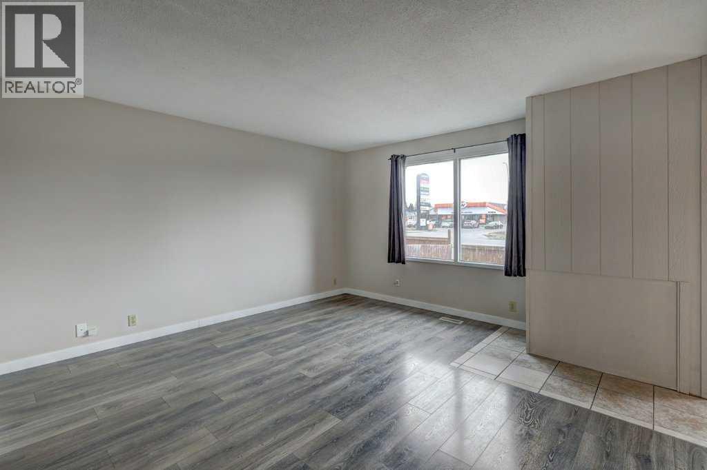 1, 519 64 Street Ne, Calgary, Alberta  T2K 2M7 - Photo 3 - A2215361