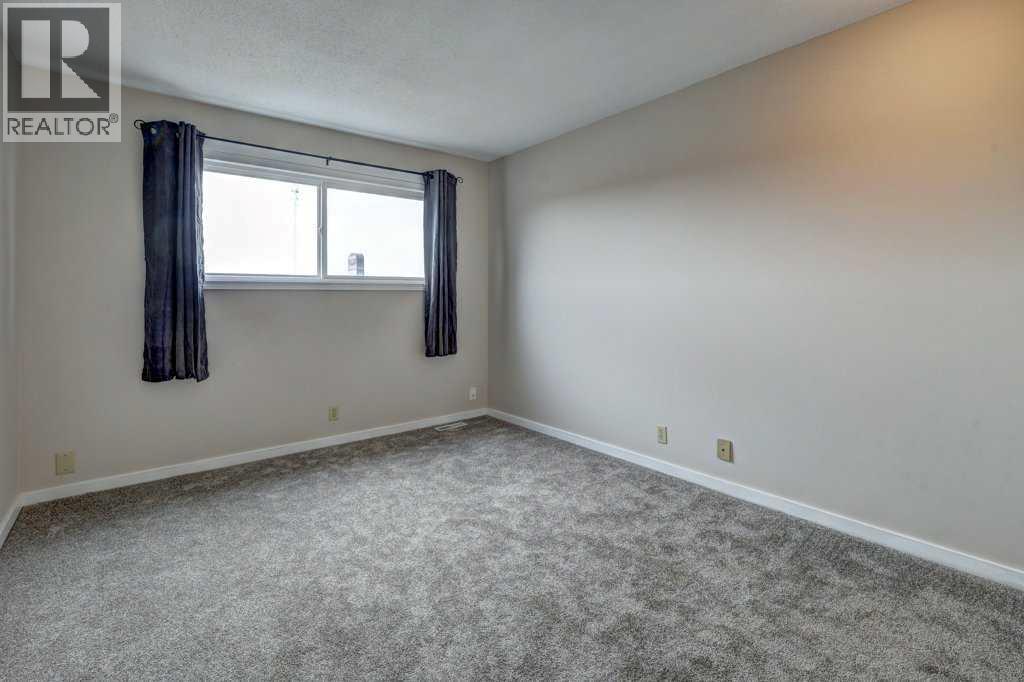 1, 519 64 Street Ne, Calgary, Alberta  T2K 2M7 - Photo 15 - A2215361