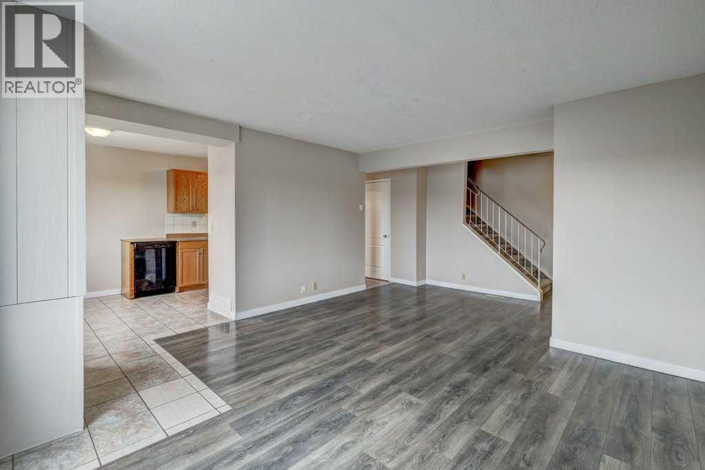 1, 519 64 Street Ne, Calgary, Alberta  T2K 2M7 - Photo 5 - A2215361