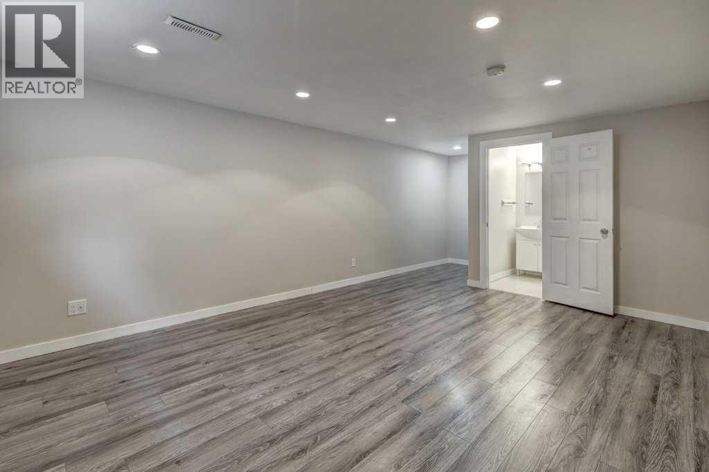 1, 519 64 Street Ne, Calgary, Alberta  T2K 2M7 - Photo 22 - A2215361