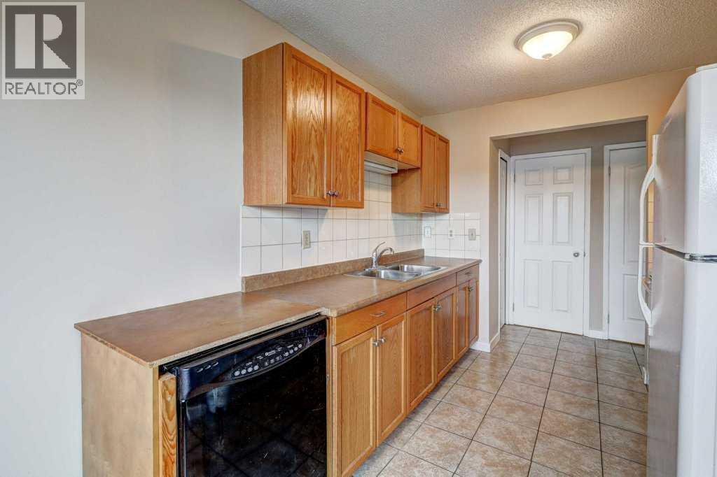 1, 519 64 Street Ne, Calgary, Alberta  T2K 2M7 - Photo 7 - A2215361