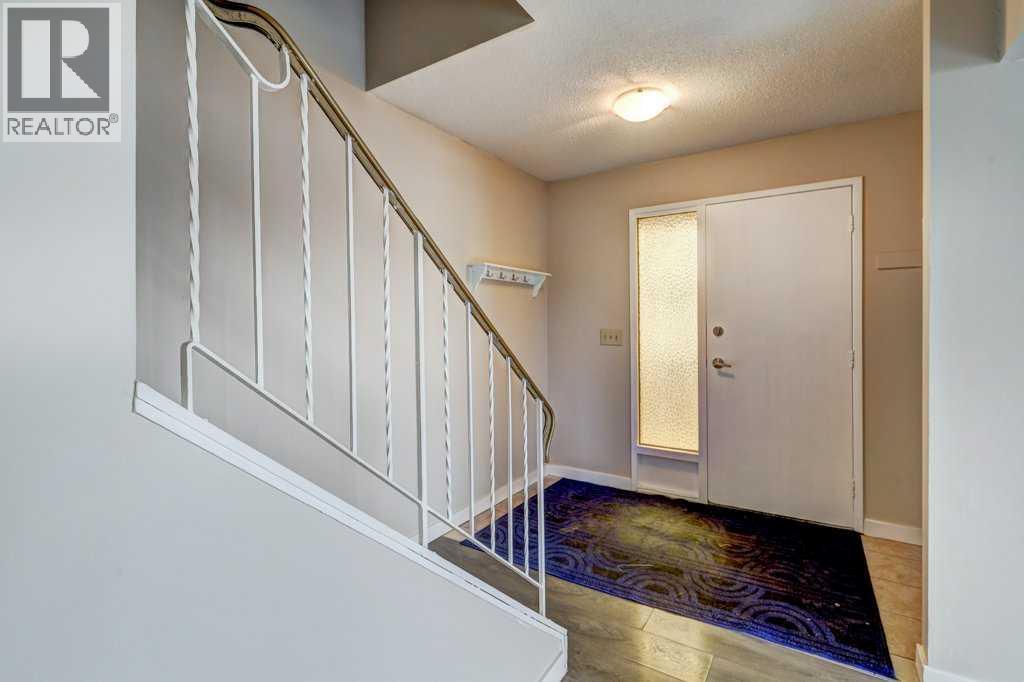 1, 519 64 Street Ne, Calgary, Alberta  T2K 2M7 - Photo 2 - A2215361