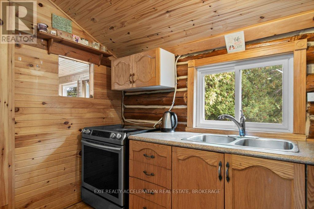 1049 Hawthorn Lane, Frontenac (Frontenac Centre), Ontario  K0H 2P0 - Photo 16 - X12476042