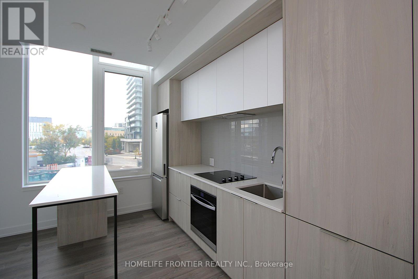202 - 395 Square One Drive, Mississauga, Ontario  L5B 0P6 - Photo 4 - W12473406