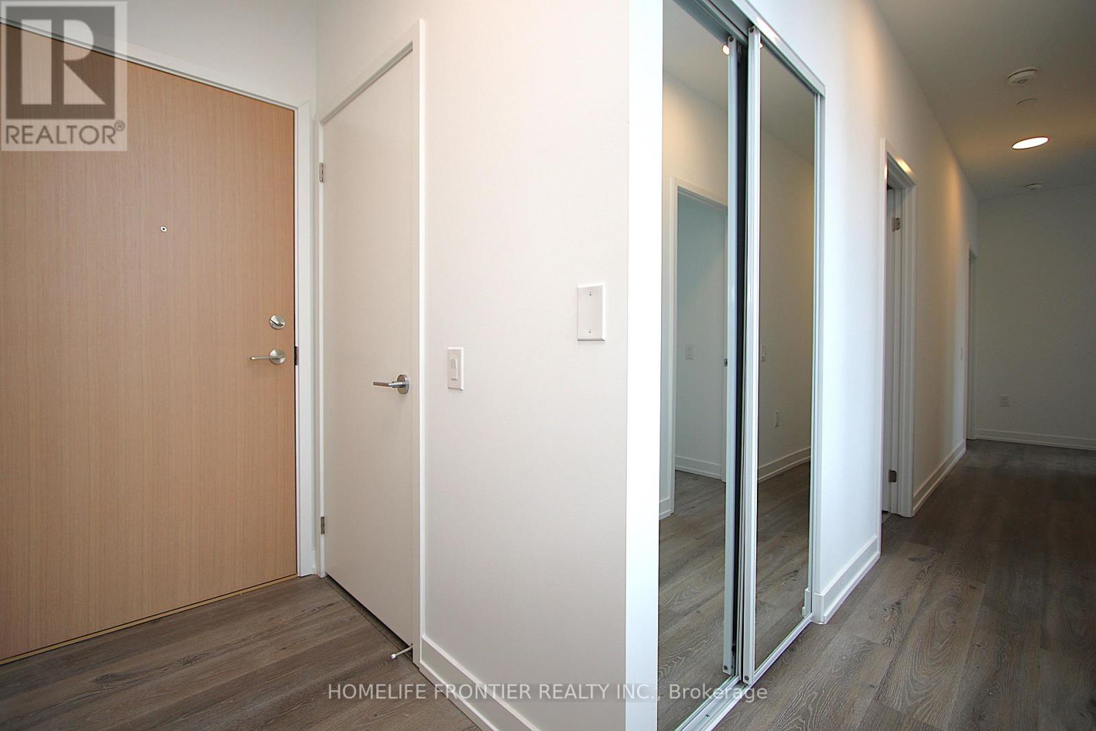 202 - 395 Square One Drive, Mississauga, Ontario  L5B 0P6 - Photo 2 - W12473406
