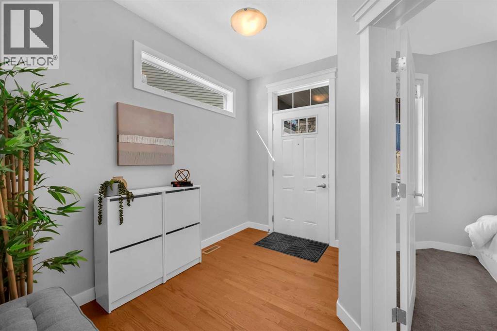 660 Reynolds Crescent Sw, Airdrie, Alberta  T4B 5G1 - Photo 4 - A2266449