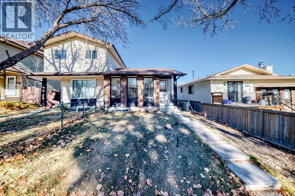 946 Berkley Drive Nw, Calgary, Alberta  T3K 1A2 - Photo 2 - A2264876