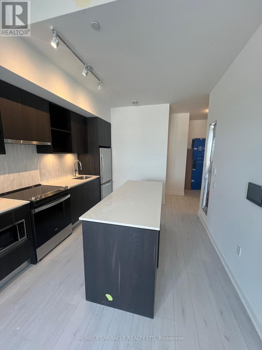 203 - 395 Dundas Street, Oakville, Ontario  L6M 5R8 - Photo 2 - W12477322