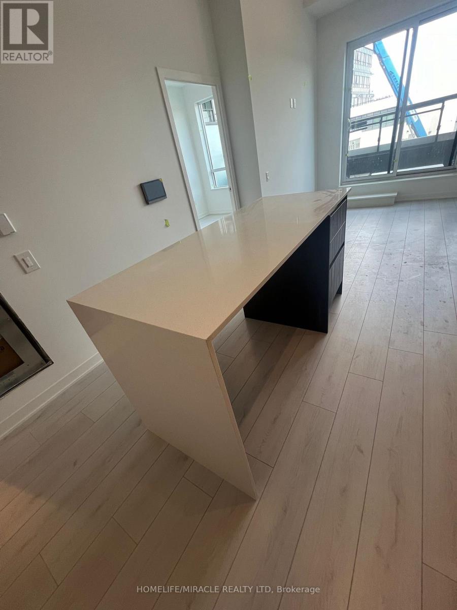 203 - 395 Dundas Street, Oakville, Ontario  L6M 5R8 - Photo 4 - W12477322