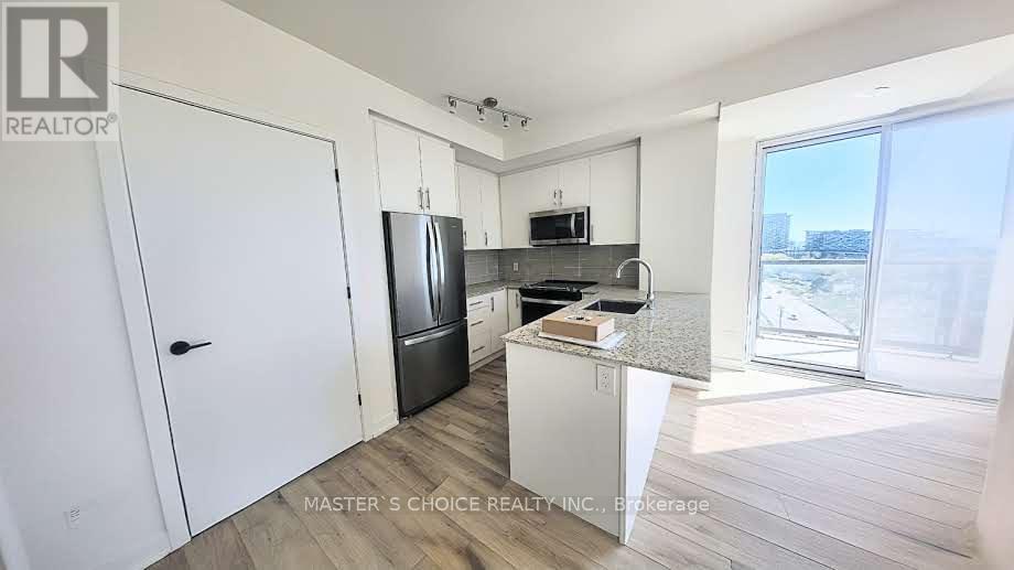 1103 - 345 Wheat Boom Drive, Oakville, Ontario  L6H 7X4 - Photo 4 - W12478356