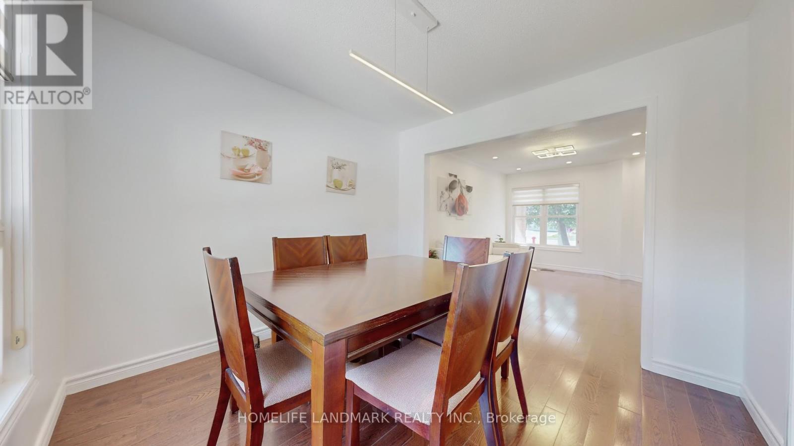 373 Kingsbridge Garden Circle, Mississauga, Ontario  L5R 1K9 - Photo 4 - W12478368