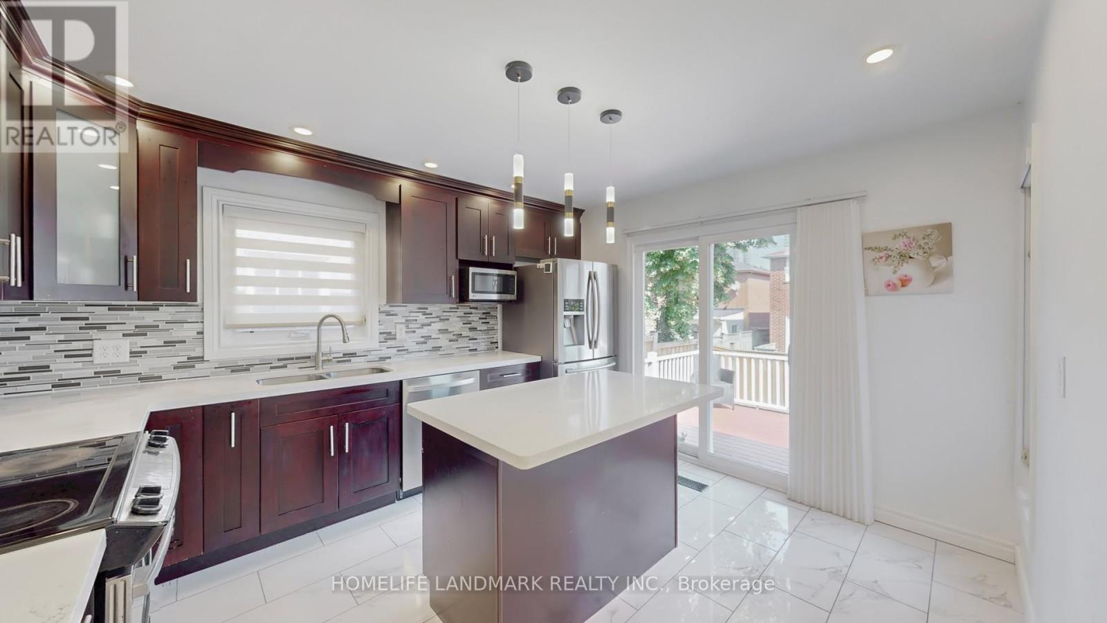 373 Kingsbridge Garden Circle, Mississauga, Ontario  L5R 1K9 - Photo 6 - W12478368