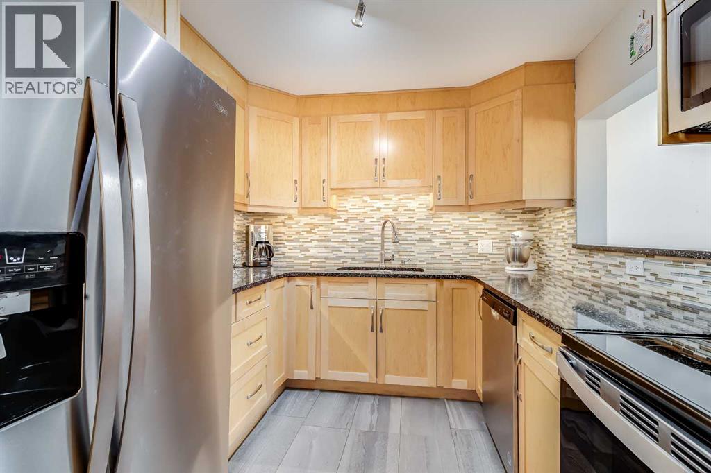 410, 3730 50 Street Nw, Calgary, Alberta  T3A 2V9 - Photo 4 - A2265884