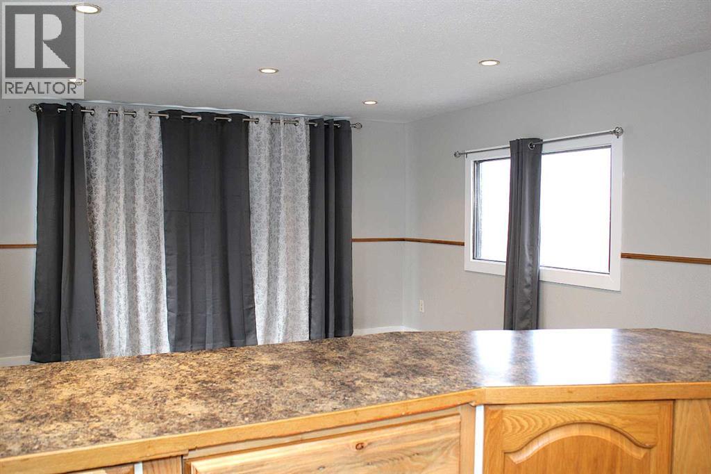 23, 111 6 Street  Se, Sundre, Alberta  T0M 1X0 - Photo 13 - A2266032