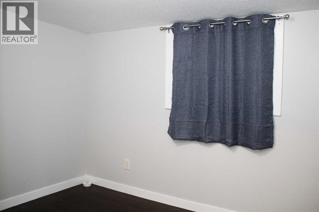 23, 111 6 Street  Se, Sundre, Alberta  T0M 1X0 - Photo 26 - A2266032