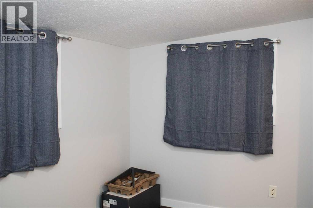 23, 111 6 Street  Se, Sundre, Alberta  T0M 1X0 - Photo 27 - A2266032