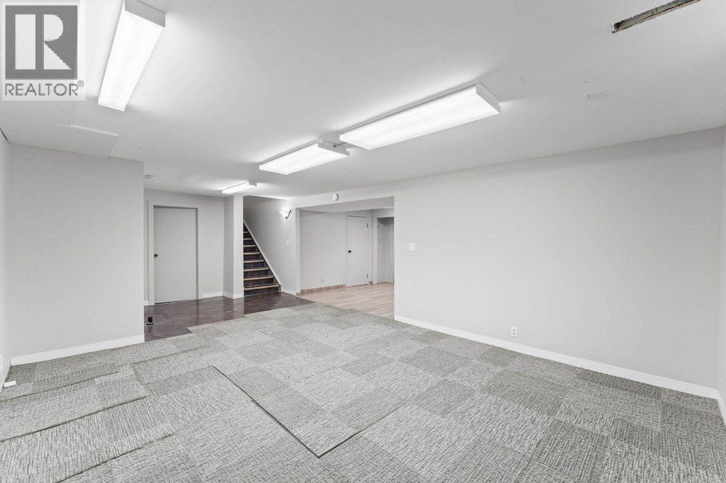 47 Woodmont Way Sw, Calgary, Alberta  T2W 4L7 - Photo 31 - A2260483