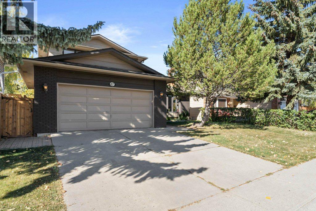 47 Woodmont Way Sw, Calgary, Alberta  T2W 4L7 - Photo 2 - A2260483
