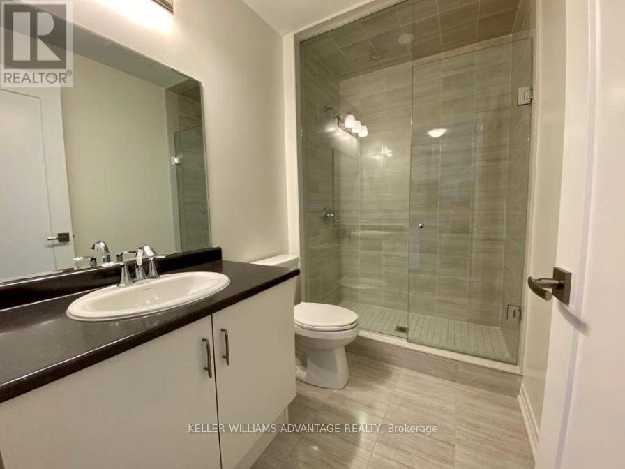 214 - 128 Grovewood Common, Oakville, Ontario  L6H 0X5 - Photo 5 - W12479067