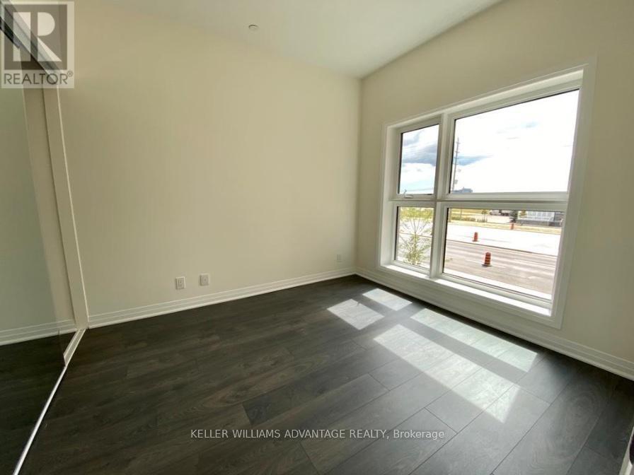 214 - 128 Grovewood Common, Oakville, Ontario  L6H 0X5 - Photo 6 - W12479067