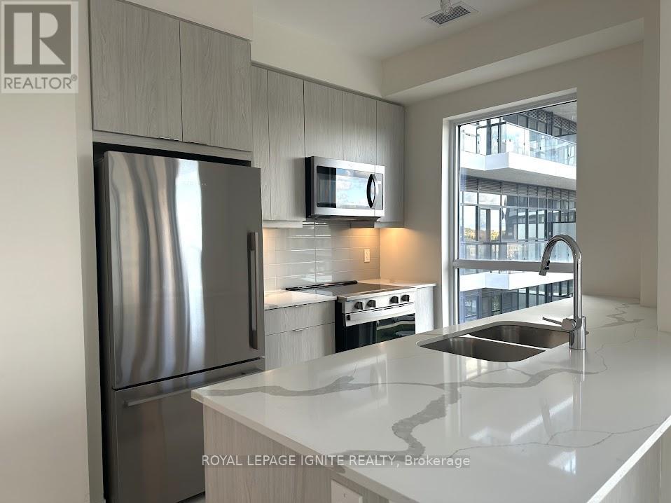 412 - 15 Watergarden Drive, Mississauga, Ontario  L5R 0H4 - Photo 5 - W12479093