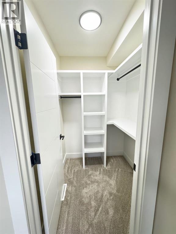 709 Mandalay Avenue, Carstairs, Alberta  T0M 0N0 - Photo 20 - A2265417