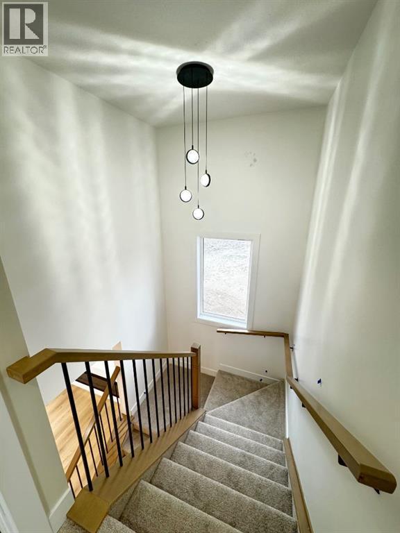 709 Mandalay Avenue, Carstairs, Alberta  T0M 0N0 - Photo 11 - A2265417