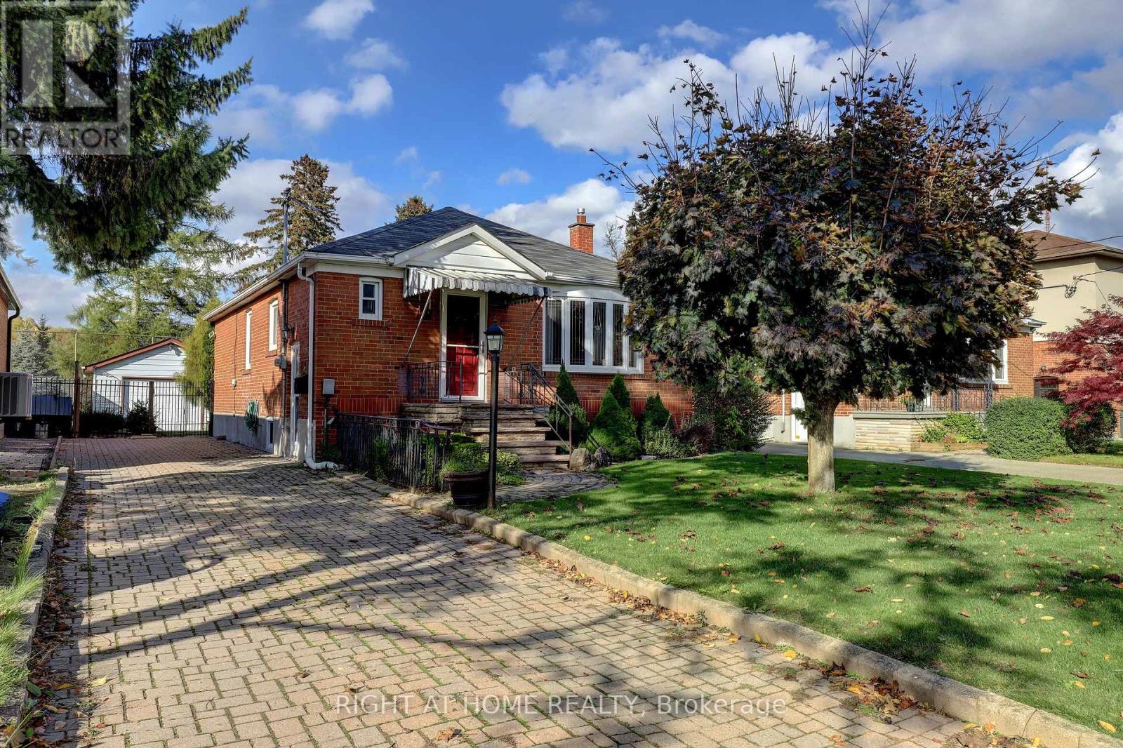 56 Cynthia Road, Toronto, Ontario  M6N 2P9 - Photo 2 - W12479120
