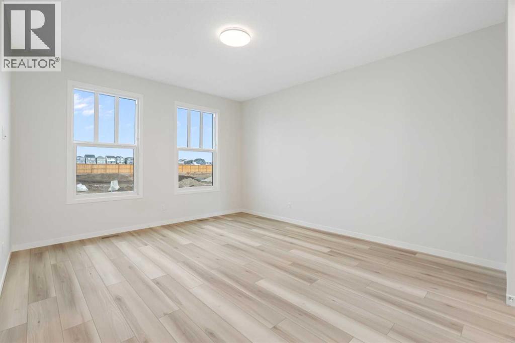 680 Buffaloberry Manor Se, Calgary, Alberta  T3M 3Z3 - Photo 3 - A2264770