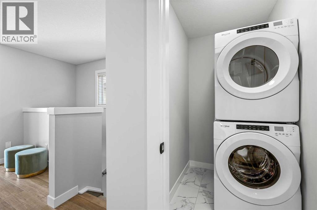 63 Raven Point Se, Calgary, Alberta  T2X 4G4 - Photo 19 - A2261932