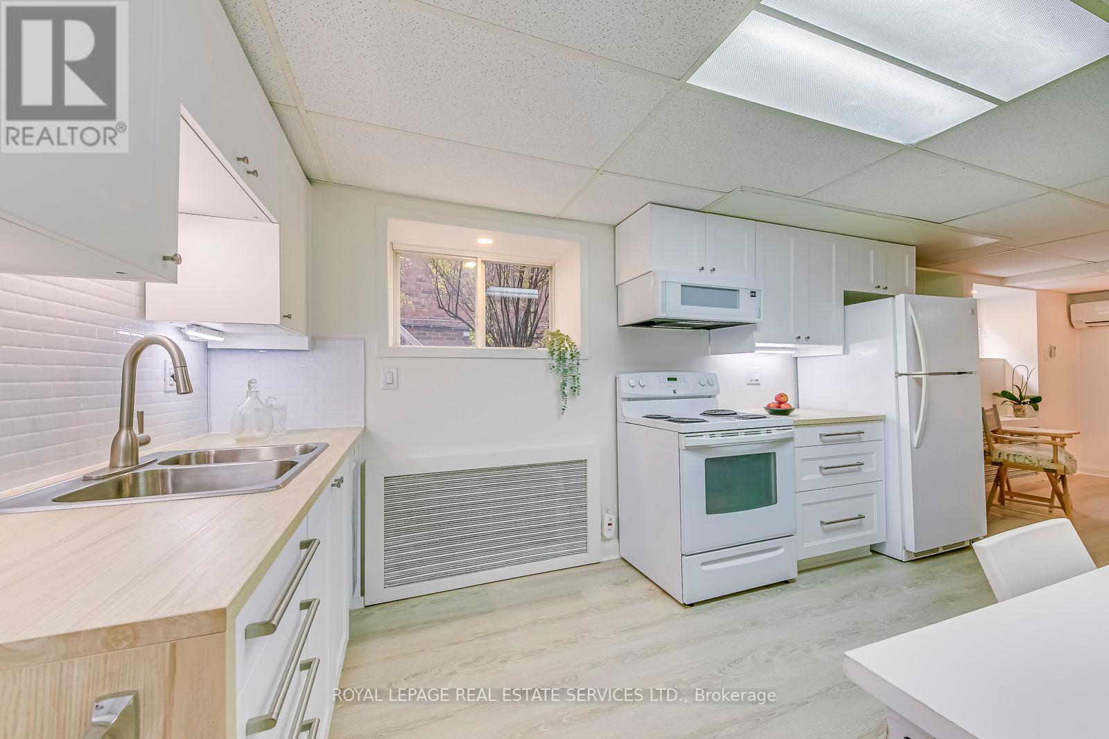 4 - 63 High Park Boulevard, Toronto, Ontario  M6R 1M9 - Photo 10 - W12465135