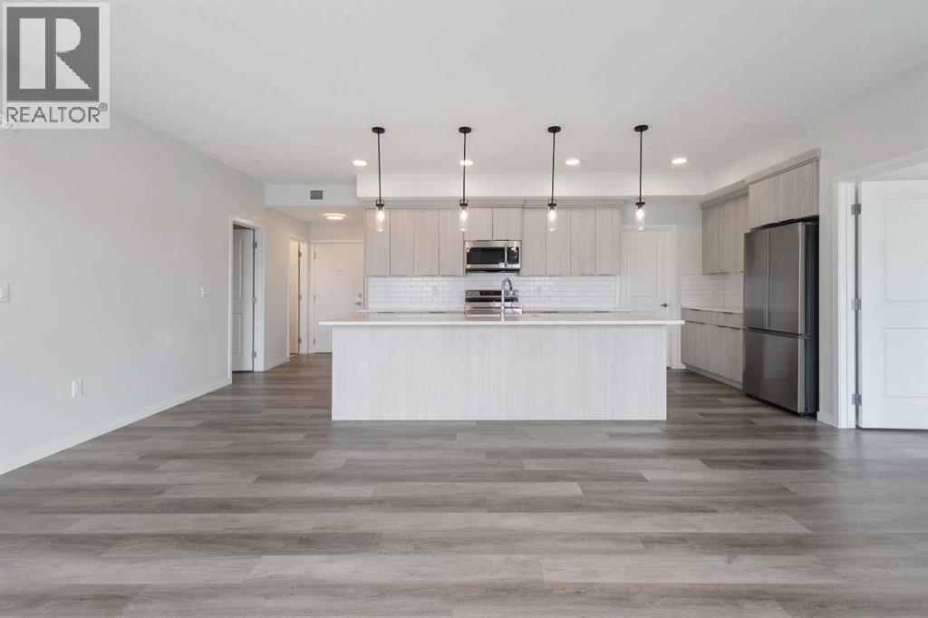 Property at 306, 360 Harvest Hills Way NE image 3