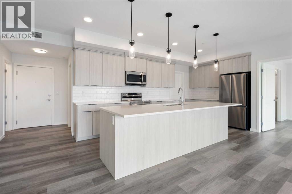 Property at 306, 360 Harvest Hills Way NE image 4