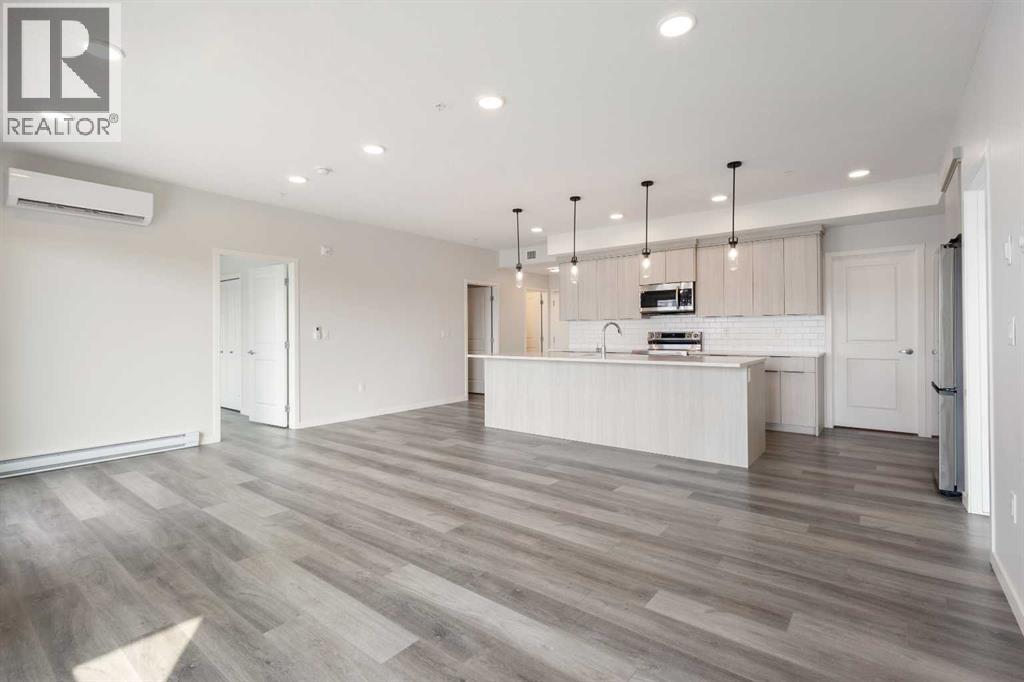 Property at 306, 360 Harvest Hills Way NE image 2