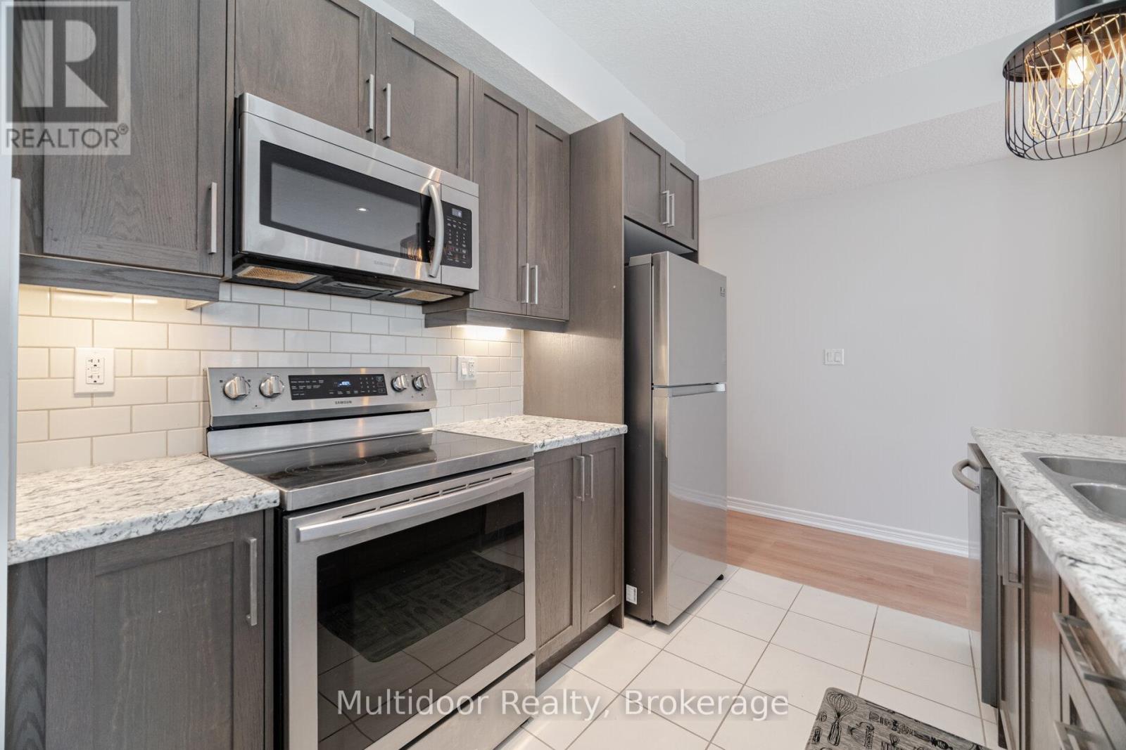 52 - 445 Ontario Street S, Milton, Ontario  L9T 9K4 - Photo 4 - W12479425