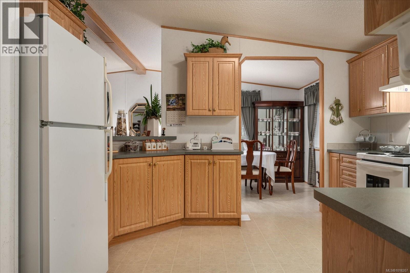 20 1247 Arbutus Rd, Parksville, British Columbia  V9P 1R3 - Photo 2 - 1018207