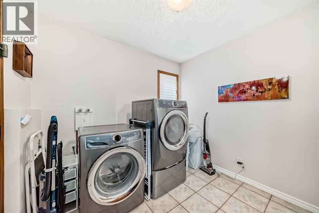 164 Woodfield Road Sw, Calgary, Alberta  T2W 3V9 - Photo 18 - A2261675