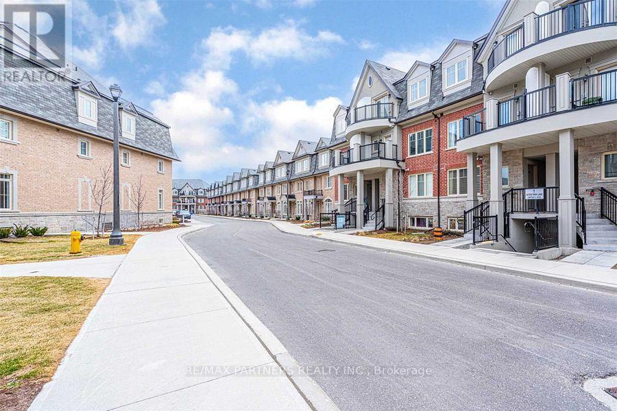 9 - 1 Eaton Park Lane, Toronto, Ontario  M1W 0A5 - Photo 2 - E12479473