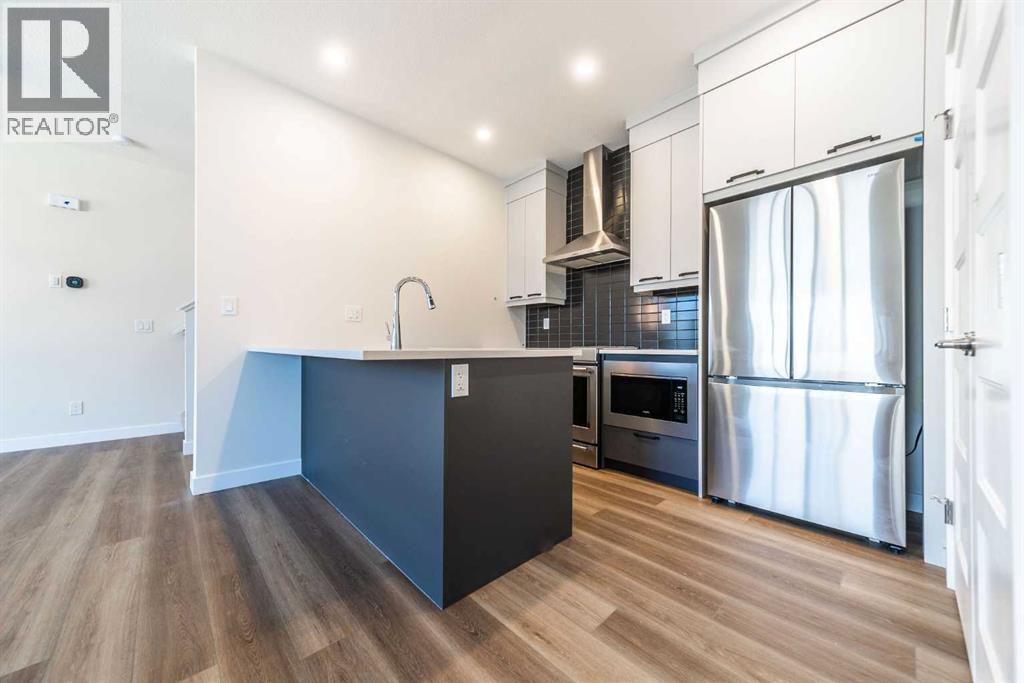 707 Sovereign Common Sw, Calgary, Alberta  T3C 3Y3 - Photo 5 - A2232784