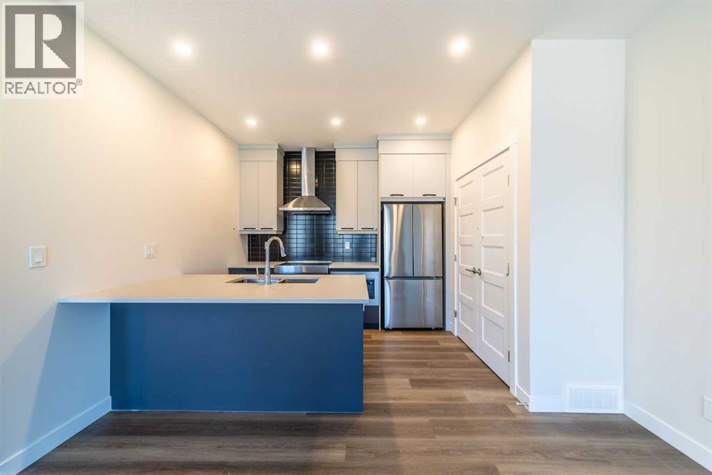 707 Sovereign Common Sw, Calgary, Alberta  T3C 3Y3 - Photo 4 - A2232784