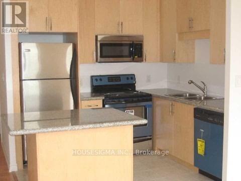 306 - 133 Wynford Drive, Toronto, Ontario  M3C 0J5 - Photo 3 - C12479643
