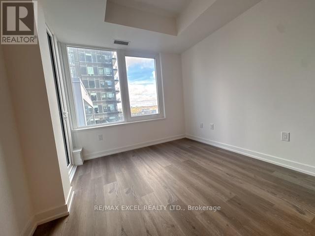 711 - 395 Square One Drive, Mississauga, Ontario  L5B 0P6 - Photo 2 - W12479754