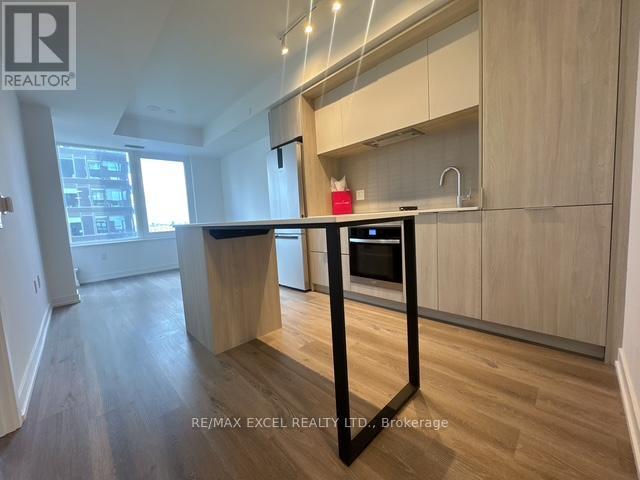 711 - 395 Square One Drive, Mississauga, Ontario  L5B 0P6 - Photo 3 - W12479754