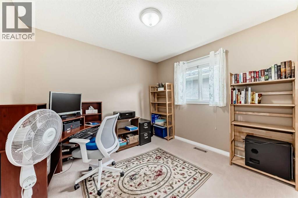 66 Cougar Ridge Circle Sw, Calgary, Alberta  T3H 5C8 - Photo 18 - A2259579