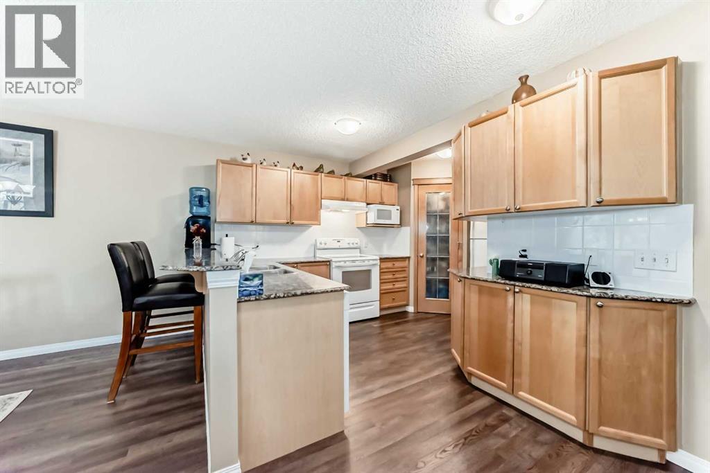 66 Cougar Ridge Circle Sw, Calgary, Alberta  T3H 5C8 - Photo 4 - A2259579