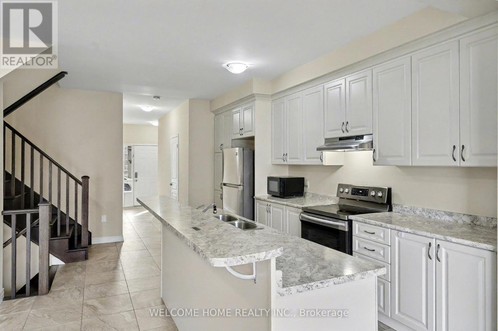 65 Bradbury Road, Hamilton, Ontario  L8J 0E4 - Photo 4 - X12479828